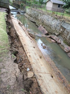 The city may spend up to $75,000 repairing sections of the channelized Griffin Creek that collapsed during recent heavy rains. 
